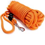 Harnais Chien Canirando Orange avec Crochet Pivotant et Corde en Nylon sur fond blanc