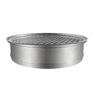 Barbecue Jetable et Rond en Acier Inoxydable sur fond blanc